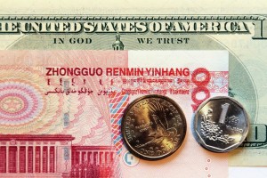 depositphotos_80602264-stock-photo-dollar-and-yuan-currency-coins
